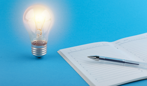 Light Bulb and Notebook