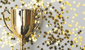 gold winners trophy with gold stars
