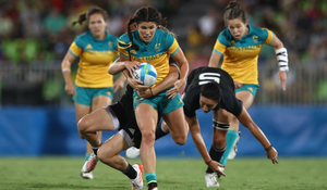 Women's rugby players dropping the ball