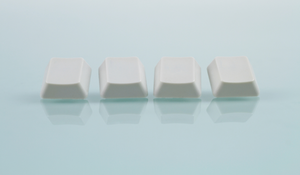 four black keyboard keys
